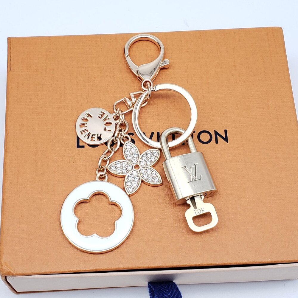 Authentic Louis Vuitton Gold Lock & Box w/ Unbranded Flower Bagcharm